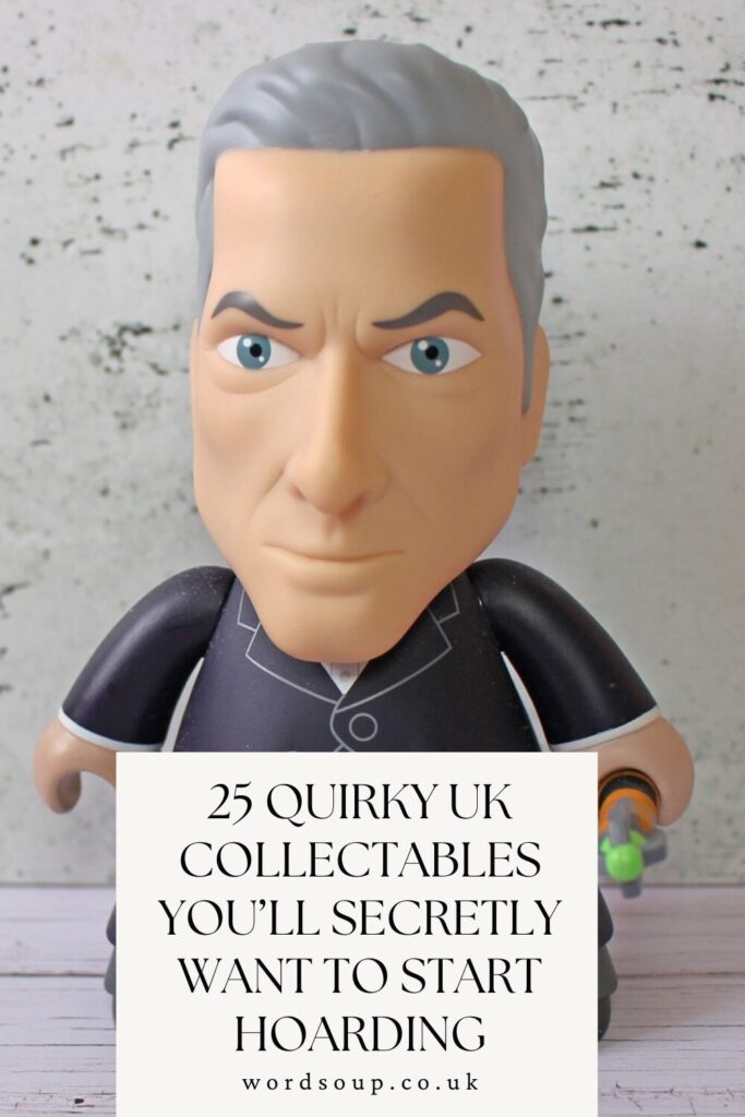 A toy figure with grey hair and a serious expression stands against a light wooden background. Over the figure’s torso is a white box with text: 25 Quirky UK Collectables You’ll Secretly Want To Start Hoarding.